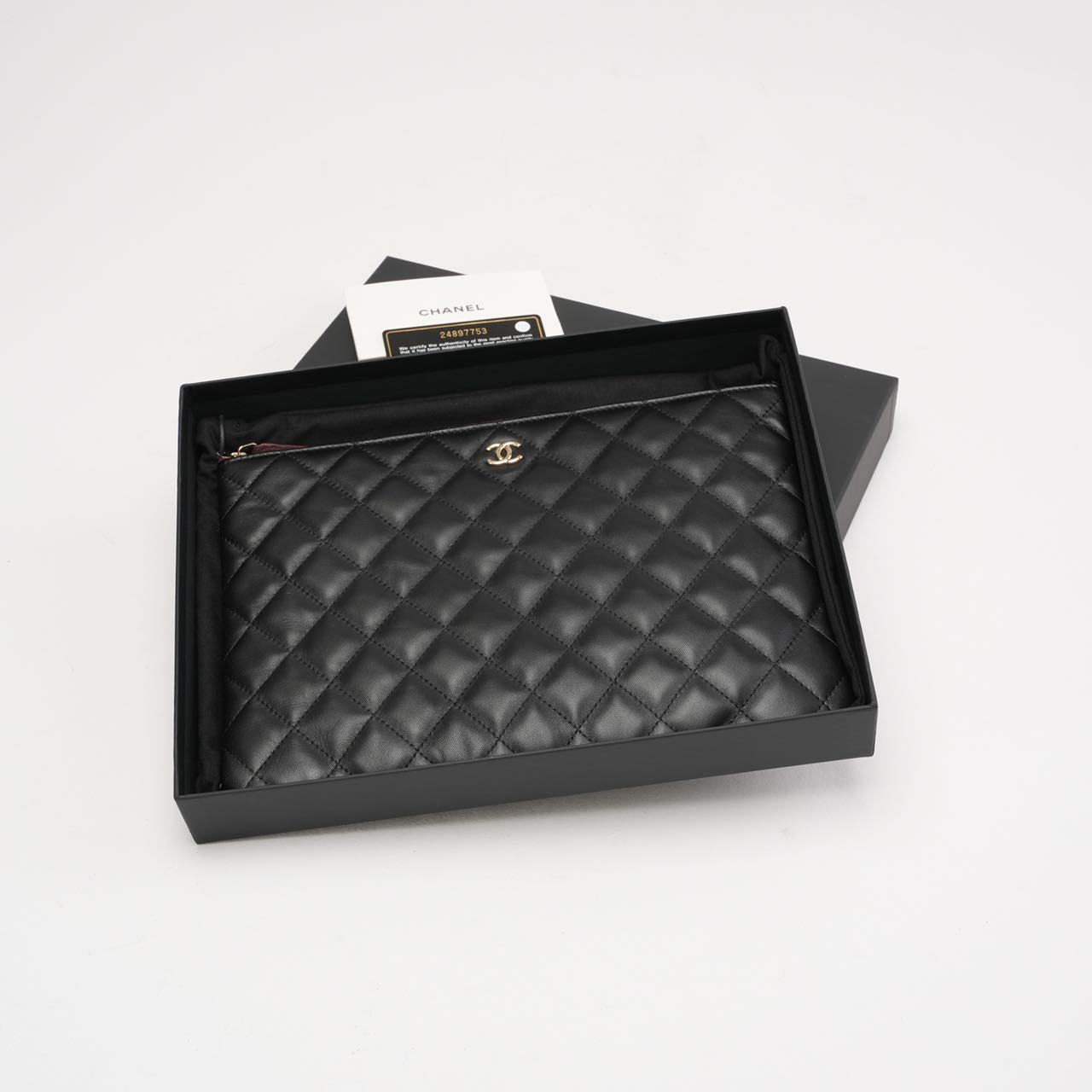 pre-owned coco-vault Chanel Classic Clutch New Medium Black 2018