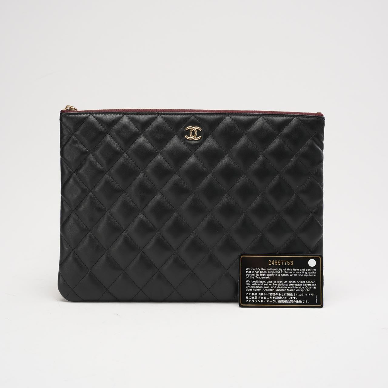 pre-owned coco-vault Chanel Classic Clutch New Medium Black 2018