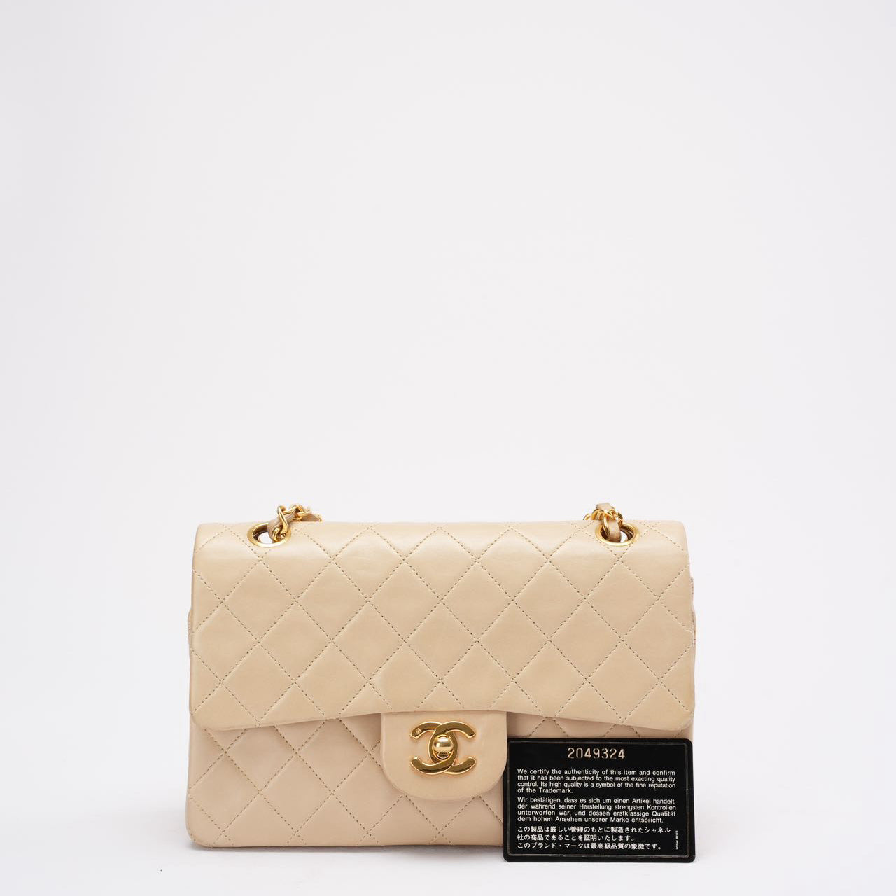 pre-owned coco-vault Chanel Vintage Beige Small Classic Double Flap Bag 1994