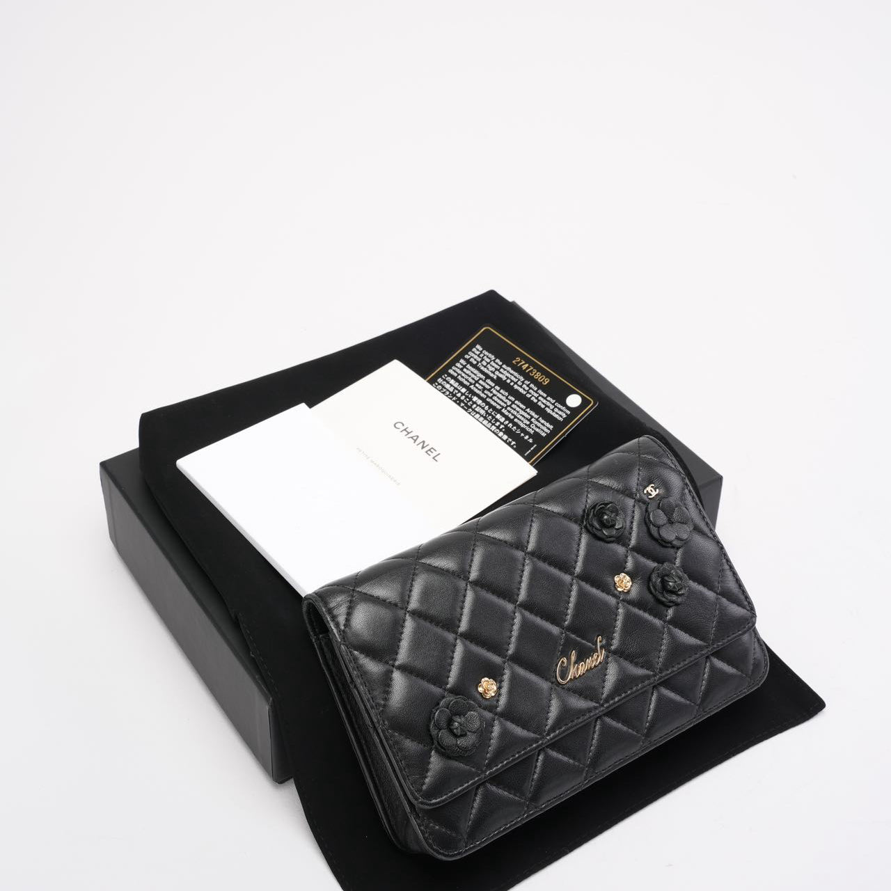 pre-owned coco-vault Chanel Wallet on Chain Black with Camélia Charms 2019