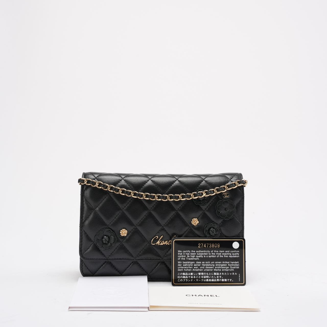 pre-owned coco-vault Chanel Wallet on Chain Black with Camélia Charms 2019