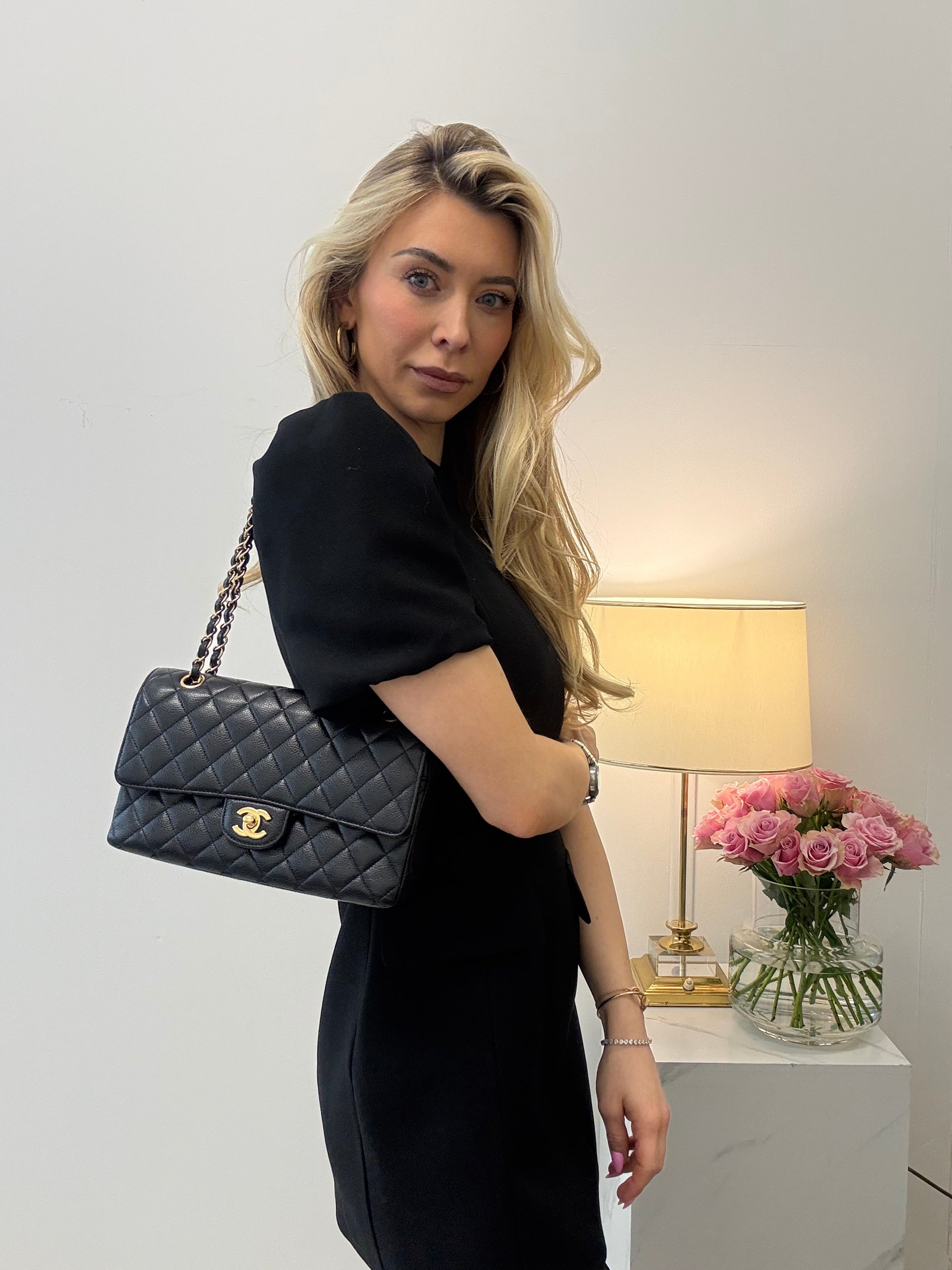 pre-owned coco-vault Chanel Black Medium Classic Double Flap Quilted Caviar 2016
