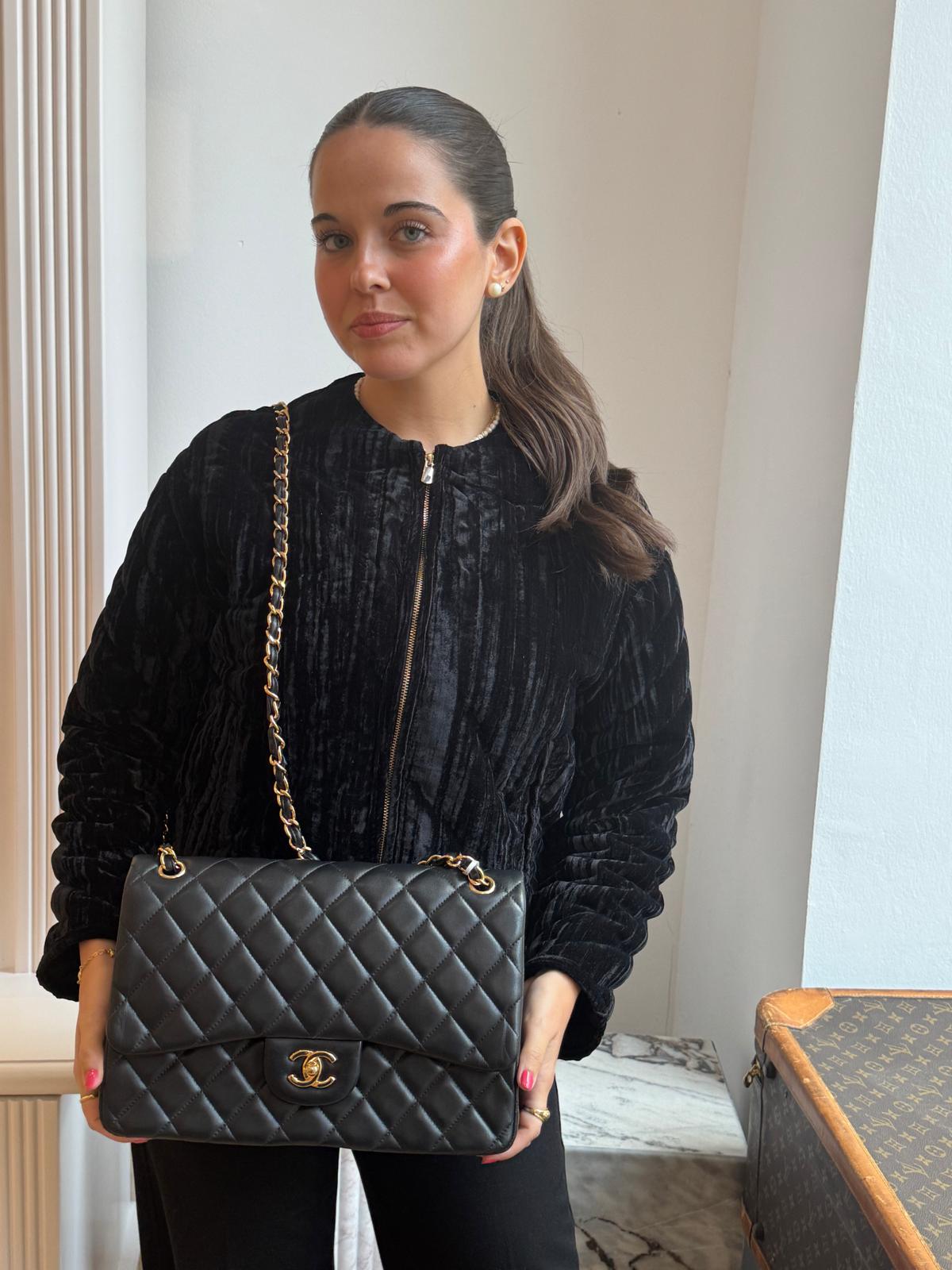 pre-owned coco-vault Chanel Black Classic Jumbo Double Flap Bag Lambskin 2011